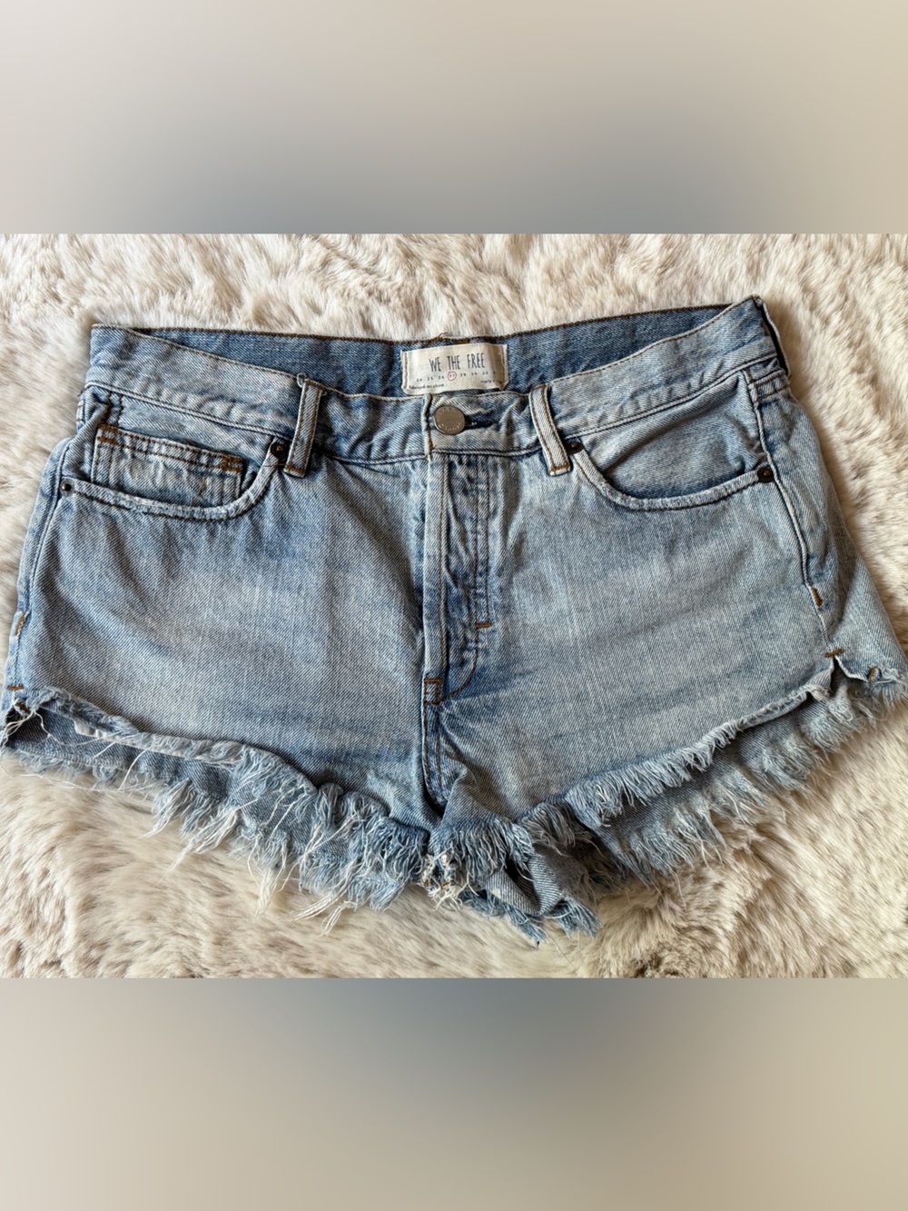We The Free Faded Light Blue Frayed-Hem shorts